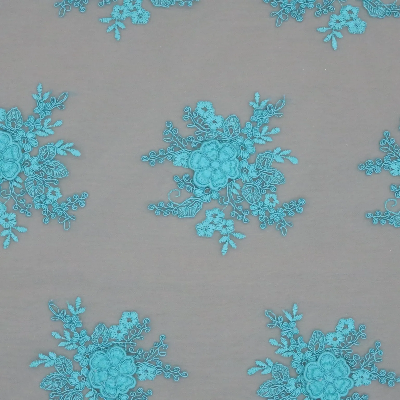 Aqua Tulle with Aqua Floral Design Embroidered Fabric