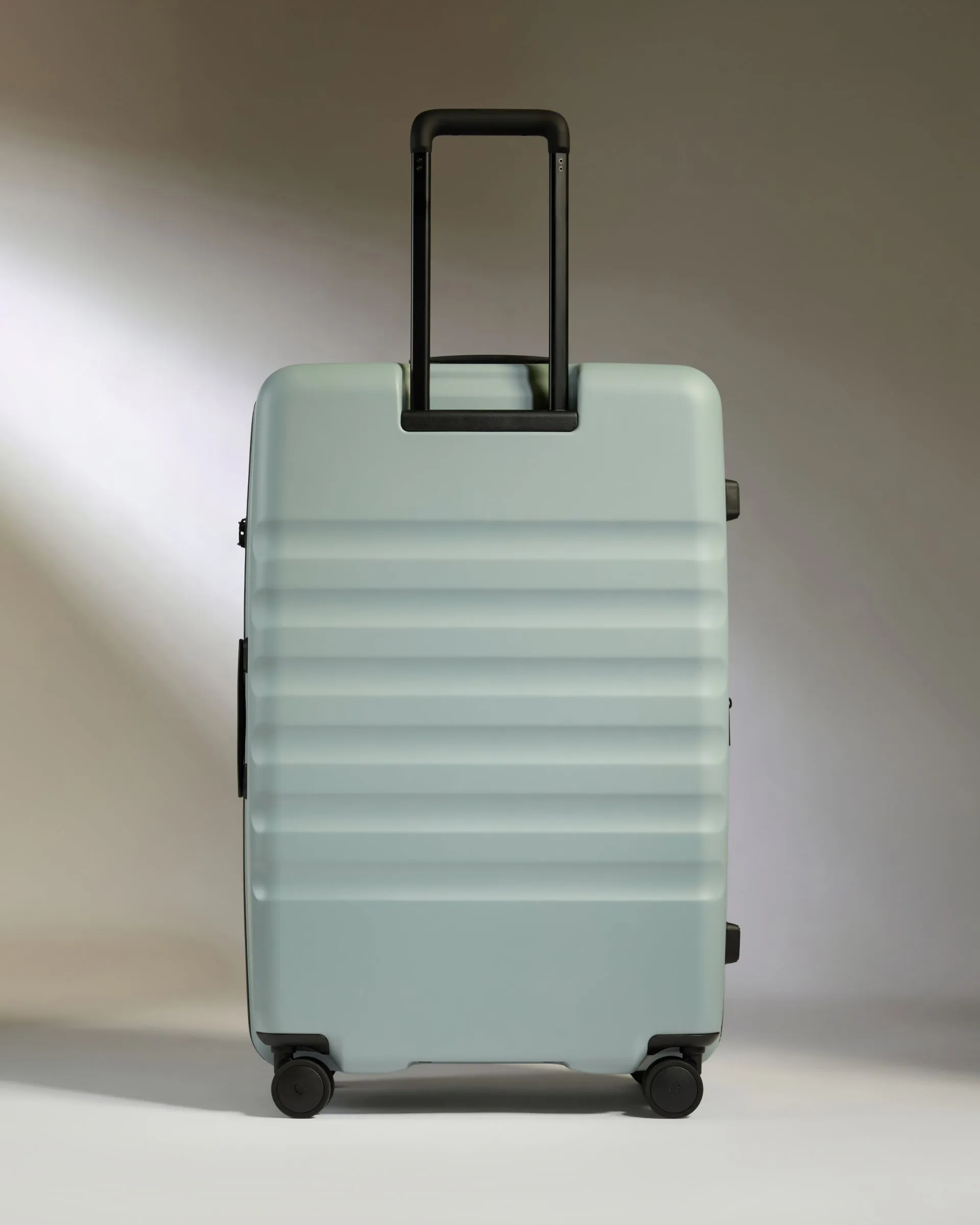 Large Suitcase in Mist Blue - Icon Stripe